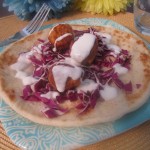Chickpea Dumplings with a Yogurt Sauce in Naan